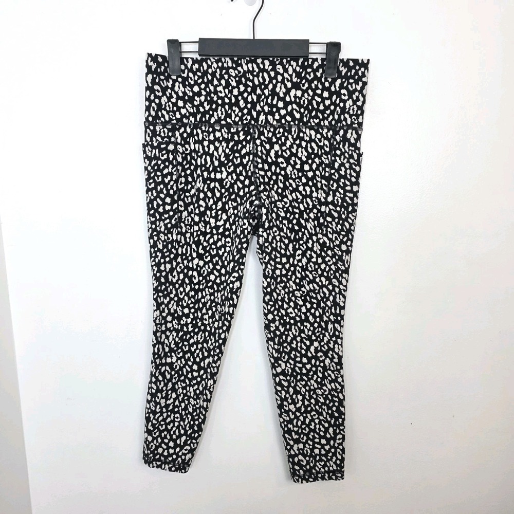 Athleta Black White Animal Print Salutation Stash Pocket II Painted‎ 7/8 Tight L